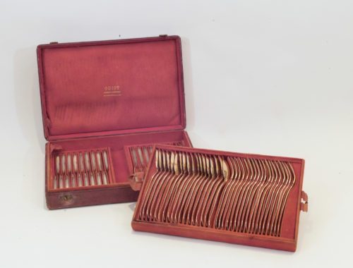 French silver-gilt cutlery in case